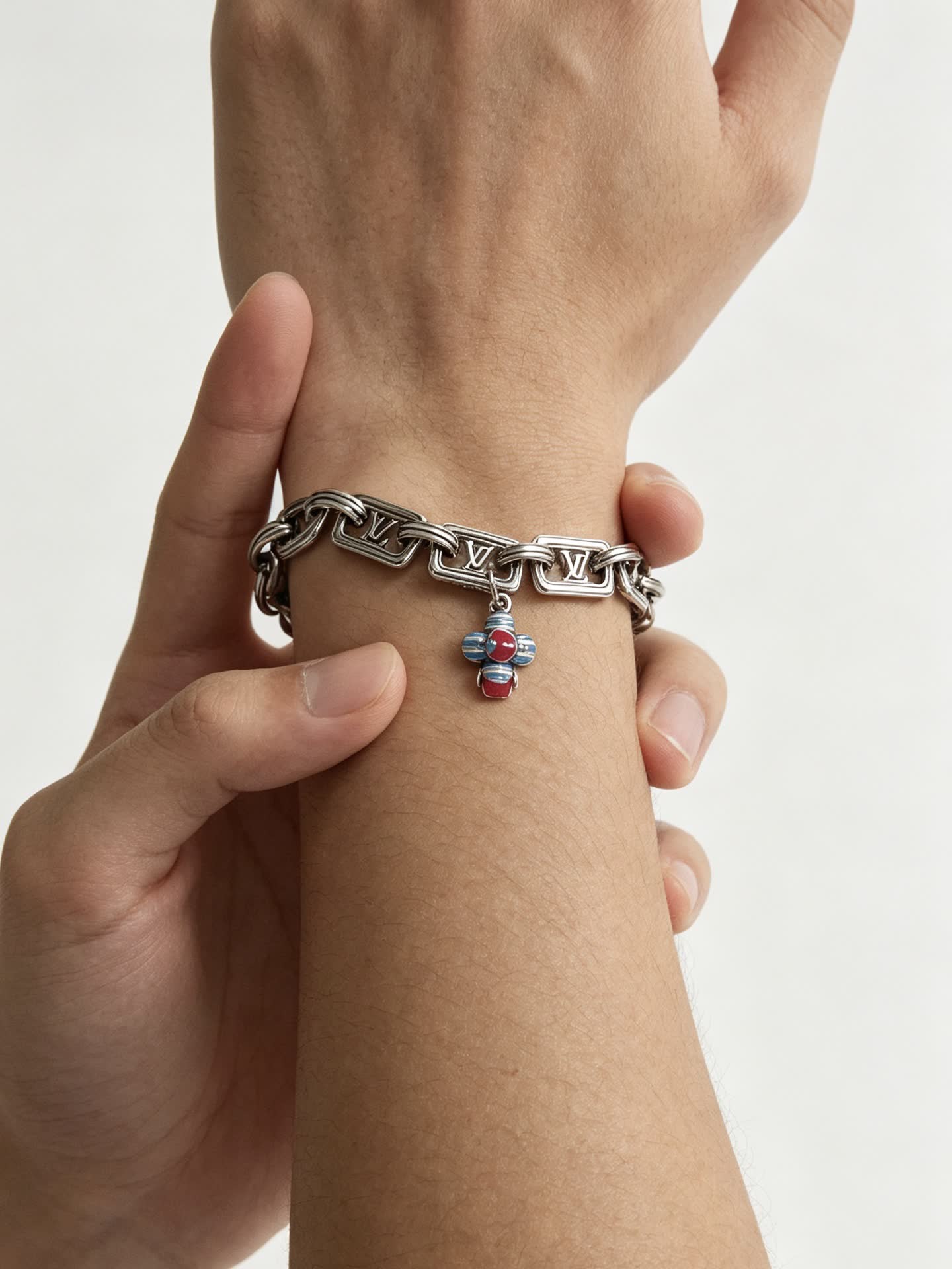 Louis Vuitton Silver Tone Bracelet with Monogram Charm